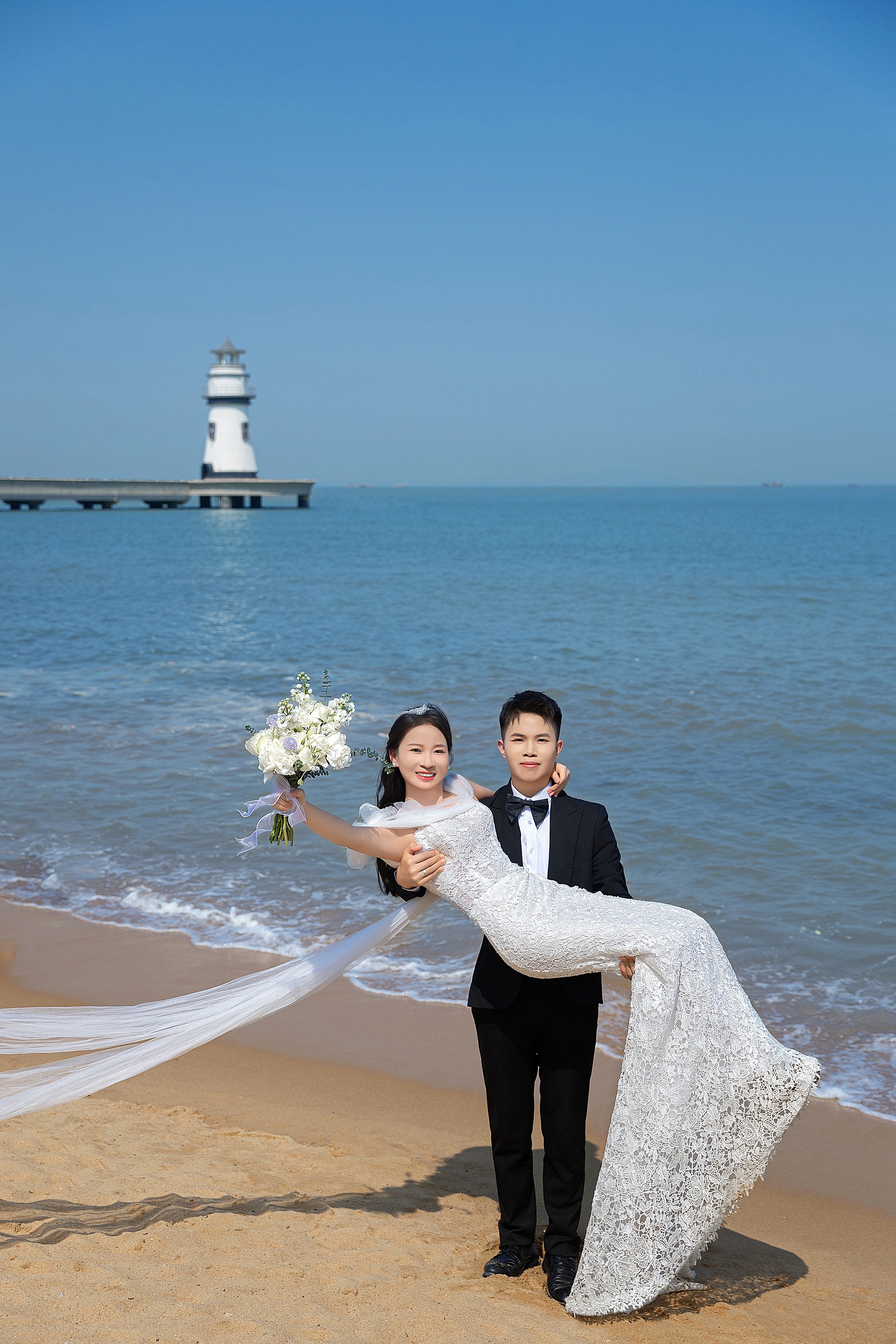 灯塔爱情邮局海景礁石沙滩婚纱照